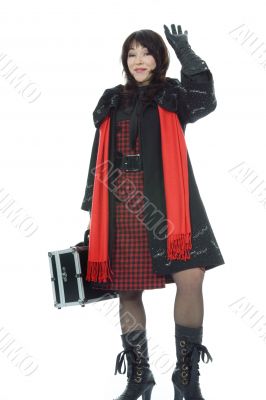 Beautifu lbrunette with valise