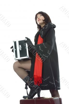 Beautifu lbrunette with valise