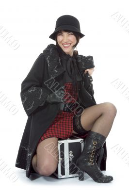 Beautifu lbrunette with valise