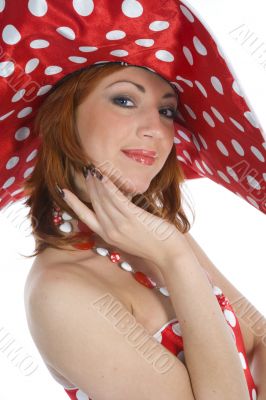 portrait redheaded with spotted dress