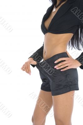 Woman showing how much weight she lo