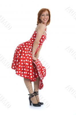 portrait redheaded with spotted dress