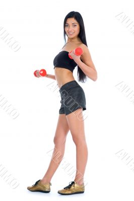 beautiful girl with dumbbells
