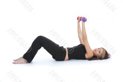 beautiful girl with dumbbells