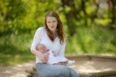 Young mother and her newborn baby