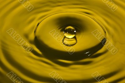 water splash in yellow