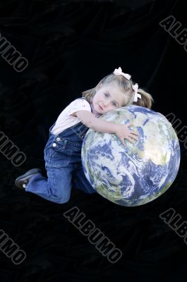 Three Year Old Girl with Earth