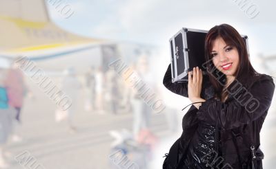 Beautiful woman with valise