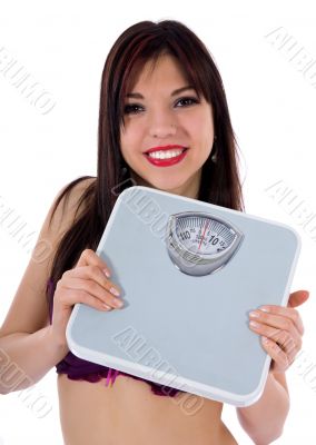 beautiful girl with  scales on  white background