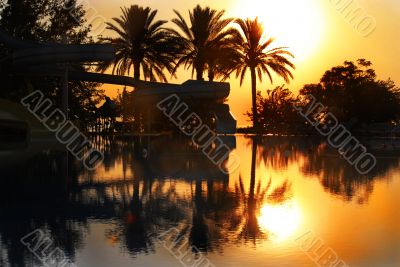 Sunrise over swimming pool