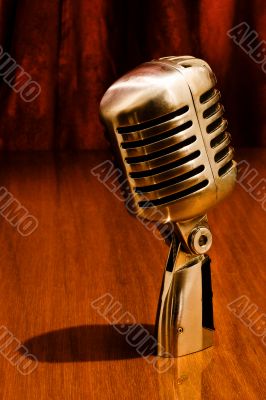 Retro microphone and red curtains