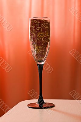 Champagne glass with a tie inside