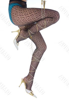 Long woman legs  in white dancing-slippers