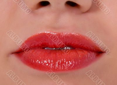 Glamour red gloss lips gesture