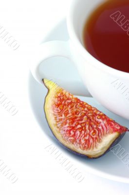 Tea cup and fig fruit