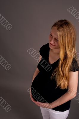 relaxing young pretty nice pregnant blonde