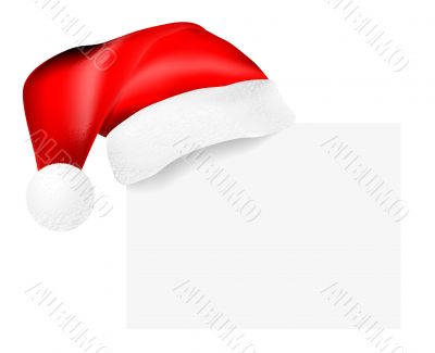 Santa`s cap hanging on a blank card