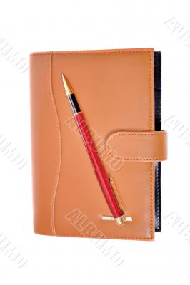 Planner and red pen