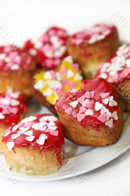 heart-shaped, richly decorated cakes 