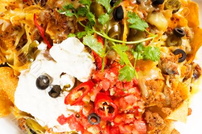 fresh nachos and vegetable salad with meat