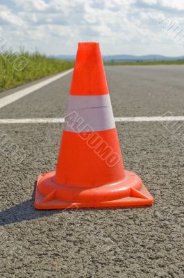 Cone on a road.