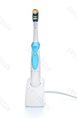 electric toothbrush on stand