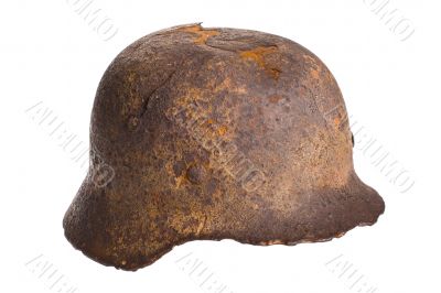 German rusty military helmet on a white