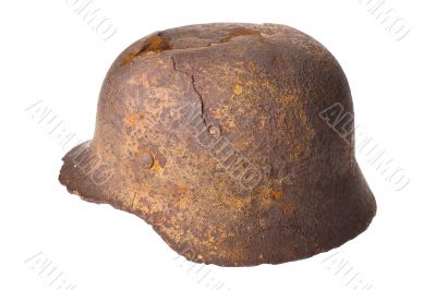 German rusty military helmet on a white