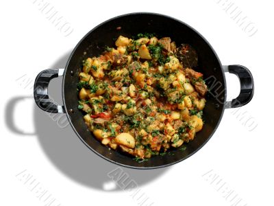 Roast in a saucepan on a white background