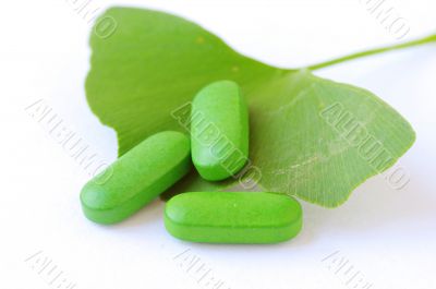Closeup of Ginkgo Biloba and herbal pills