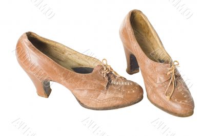 Old vintage traditional womans shoes isolated with clipping path.