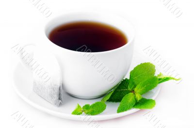 Cup of black tea with mint