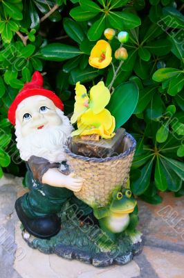 Gnome with yellow flowers
