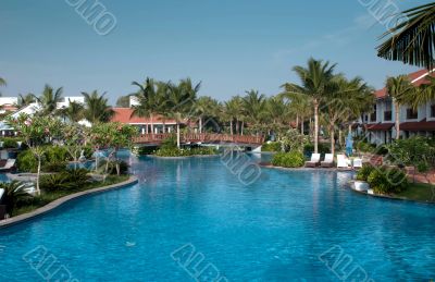 A beautiful large swimming pool at a local resort