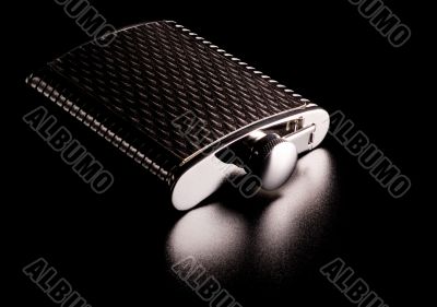 alcohol grooved flask isolated on black