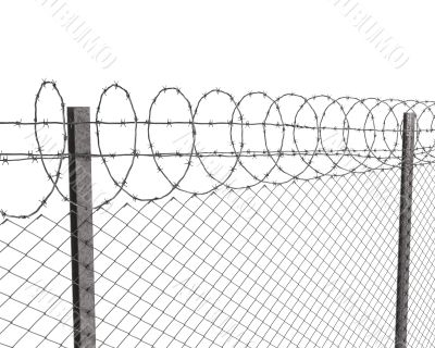 Chainlink fence with barbed wire on top 