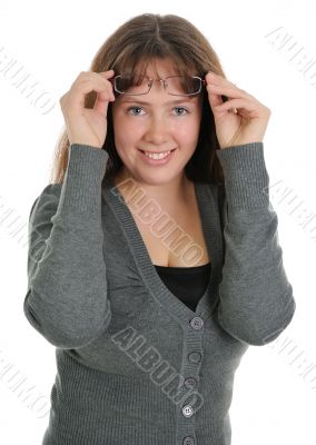 The woman looking from under glasses 