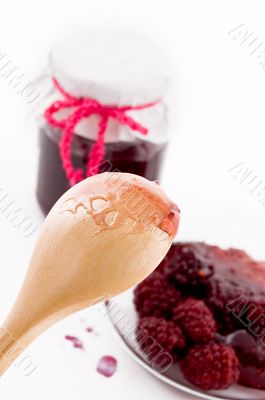 Spoon with blackberry jam