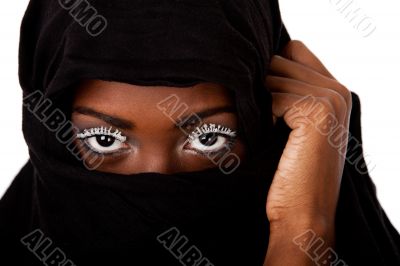 Female face in black scarf