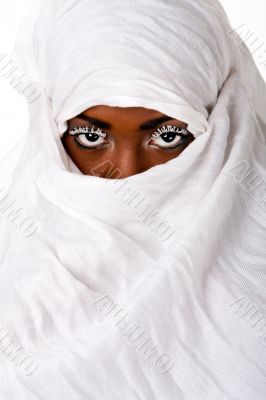 Female face in white scarf