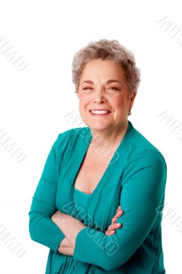 Happy smiling senior woman with arms crossed
