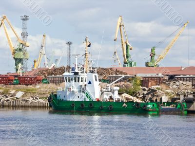 the green tugboat in the trade port