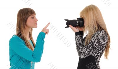 Girl taking picture of friend