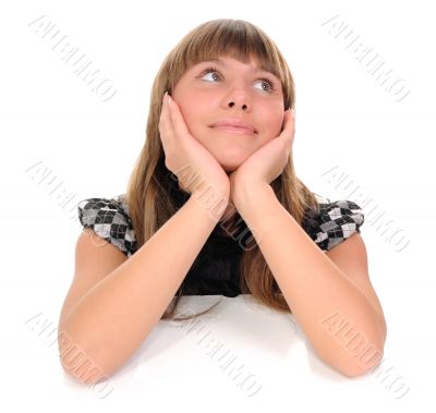 The girl looking upwards.