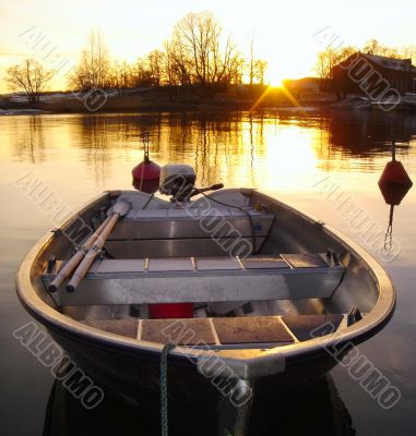 Golden Boat on Sunset in Finland