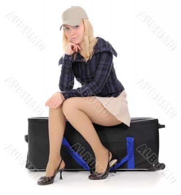The blonde Sitting On Suitcase