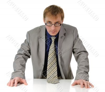 The man looking atop of glasses