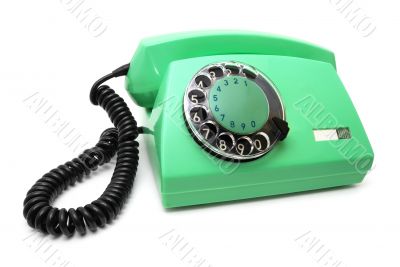 Green telephone with a disk