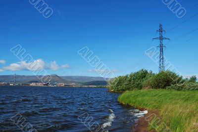factory on coast of lake