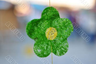 green textile flower